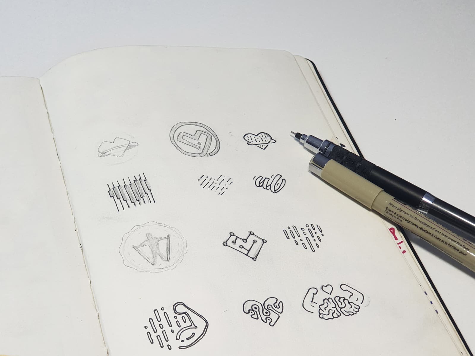 Acculete logo sketches